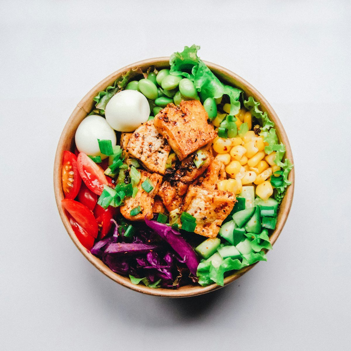 A balanced dinner bowl with vegetables, protein and whole grains